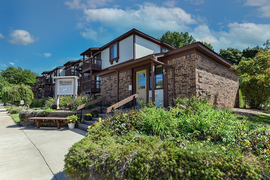 A leasing office with a welcome sign at Old Monterey Apartments, Springfield, MO