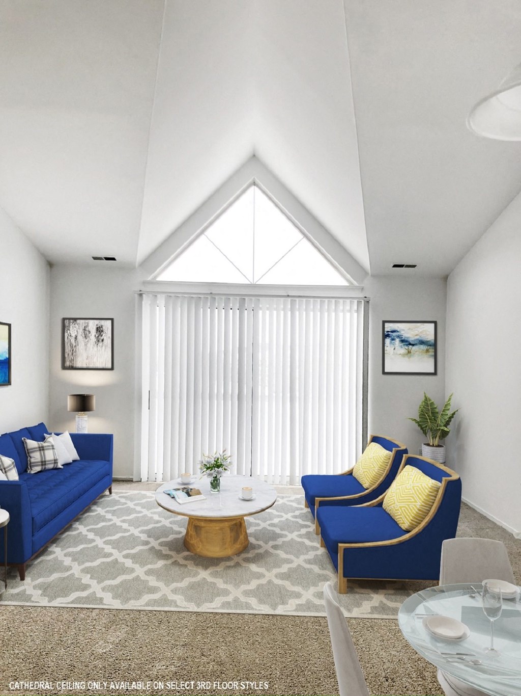 a living room with blue couches and yellow pillows  at Northport Apartments, Michigan