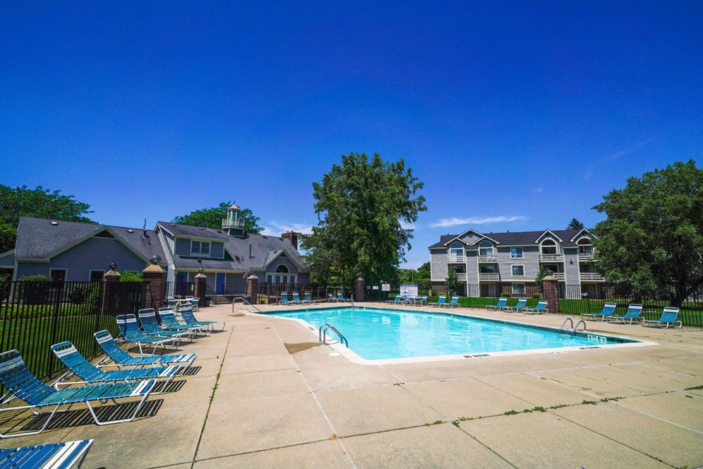 Poolside Relaxing Area at Pine Knoll Apartments, Michigan