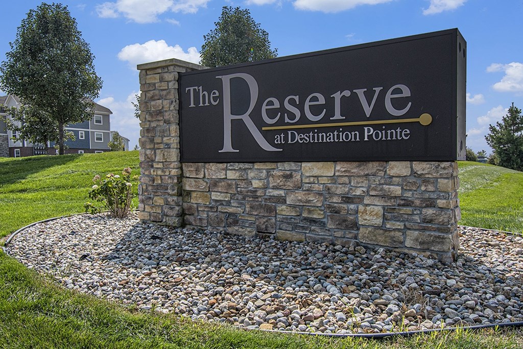 A sign that says The Reserve at Destination Pointe at The Reserve at Destination Pointe, Grimes, Iowa