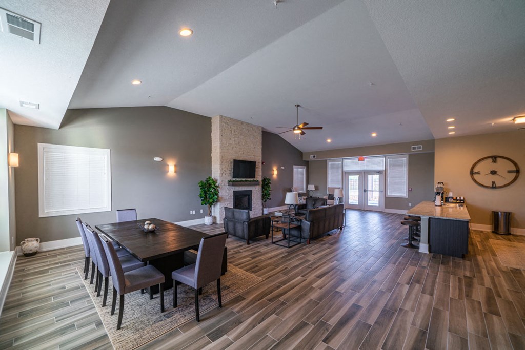 Clubroom With Smart Tv And Fireplace at Strathmore Apartment Homes, Iowa
