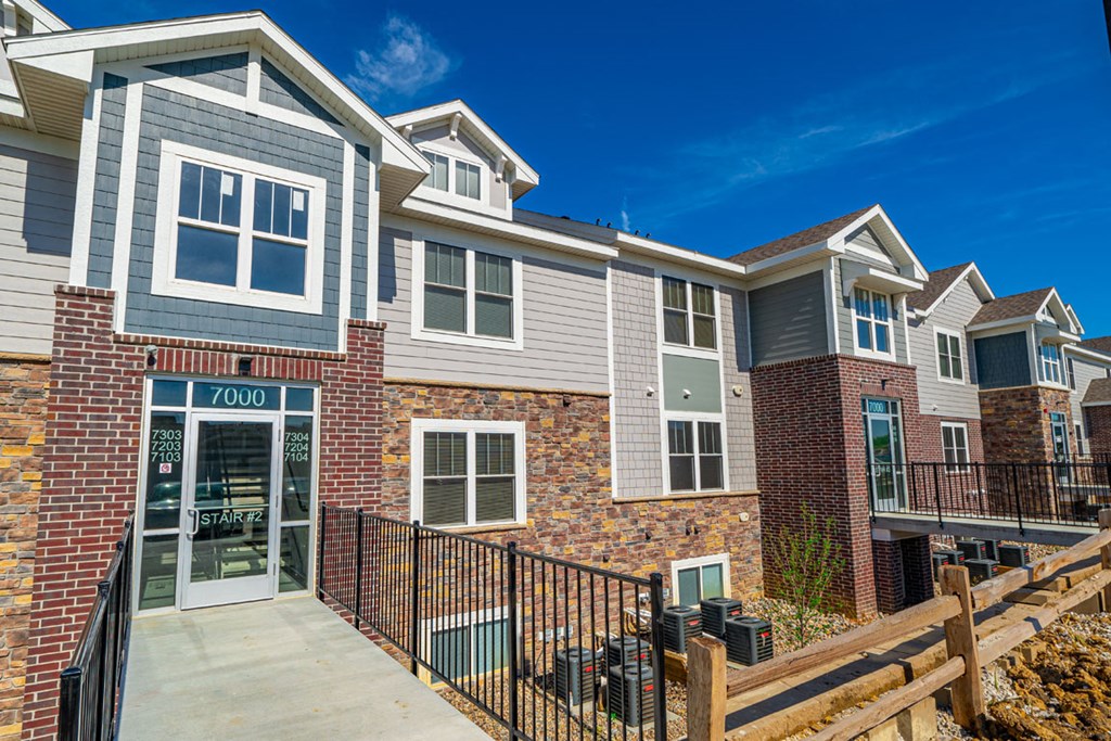 Elegant exterior building view at Strathmore Apartment Homes, West Des Moines, IA