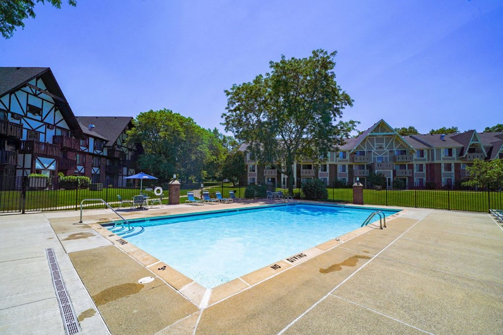 Outdoor Pool with Large Sundeck at Swiss Valley Apartments, Wyoming, 49509