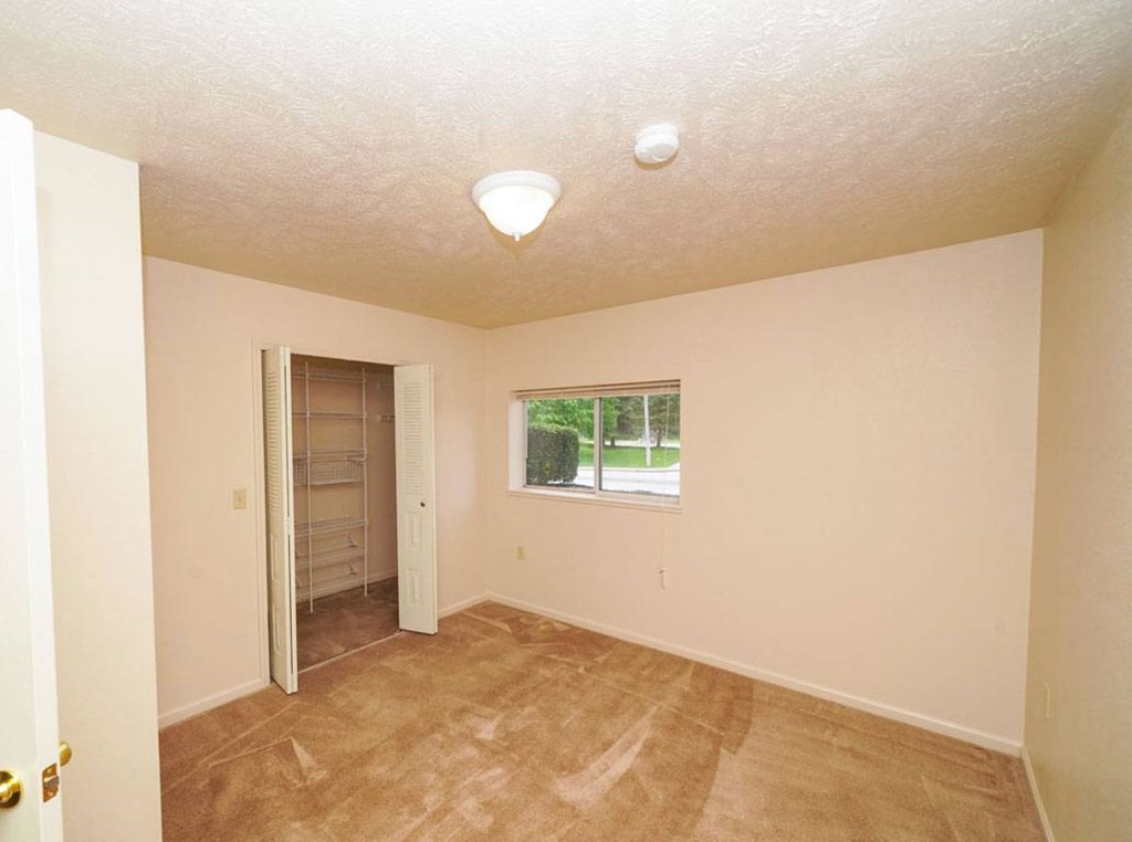 Bedroom with Walk In Closet at The Highlands Apartments in Elkhart, IN