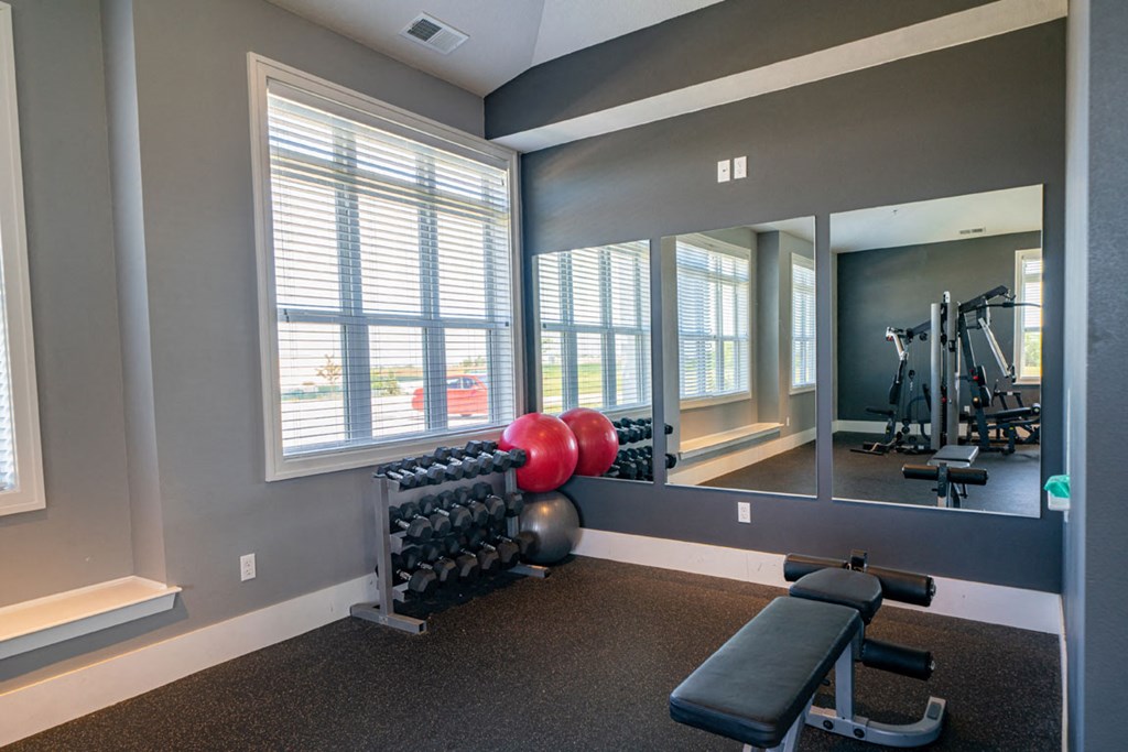 Free Weights In Gym at The Reserve at Destination Pointe, Iowa, 50111