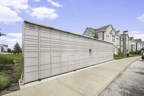 Amazon Hub branded mailbox is on the sidewalk at Tracy Creek Apartments, Perrysburg