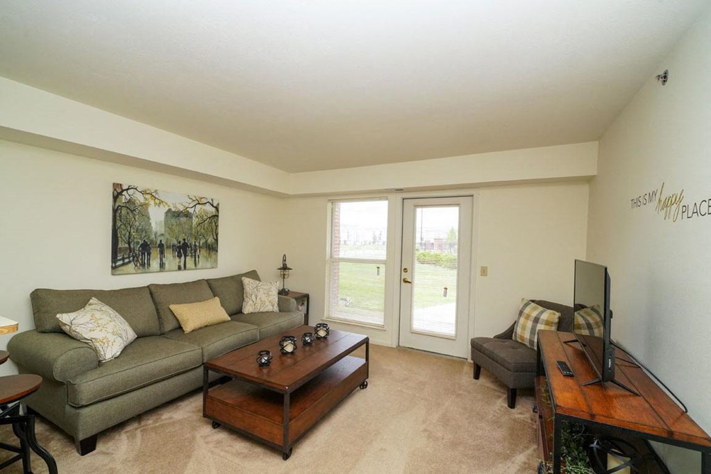 Carpeted Living Rooms at Tracy Creek Apartment Homes, Ohio 43551