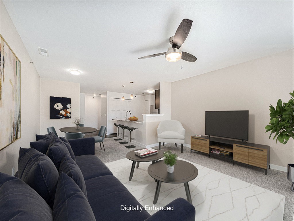 living room with a ceiling fan at Trade Winds Apartment Homes, Elkhorn, Nebraska