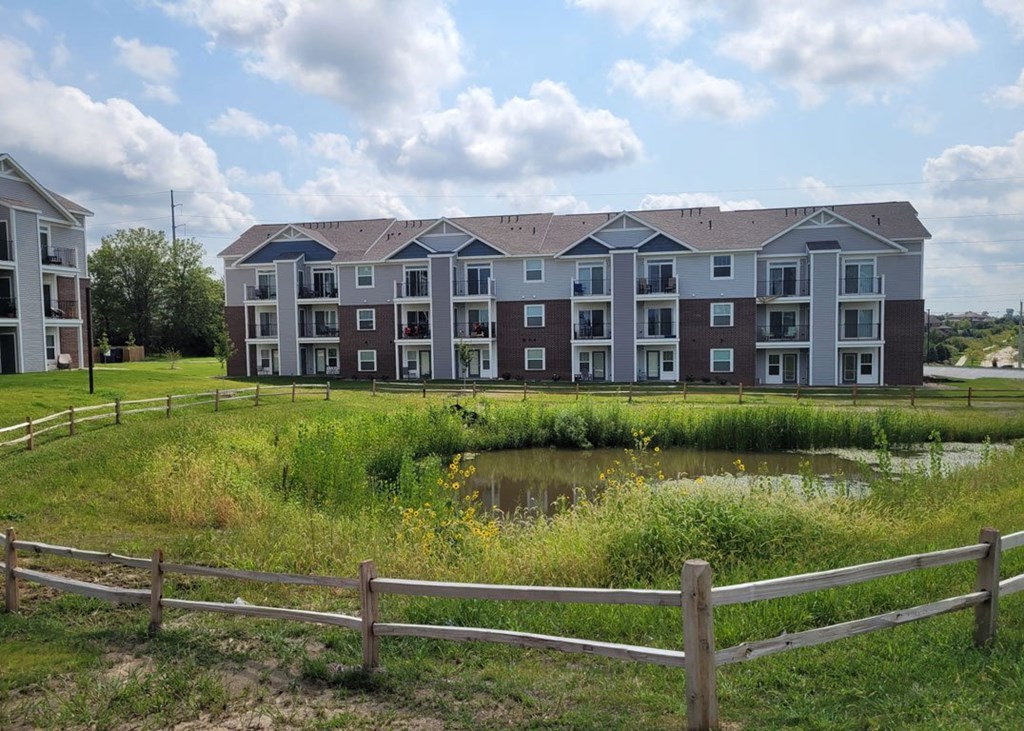 Rear Exterior Building View at Trade Winds Apartment Homes in Elkhorn, NE 68022