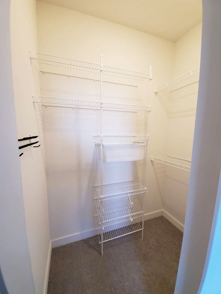 Built In Shelving In Closet at Trade Winds Apartment Homes, Elkhorn