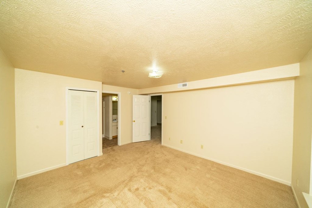 Master Bedroom with Ensuite at Trillium Pointe Apartment Homes in Jackson, MI