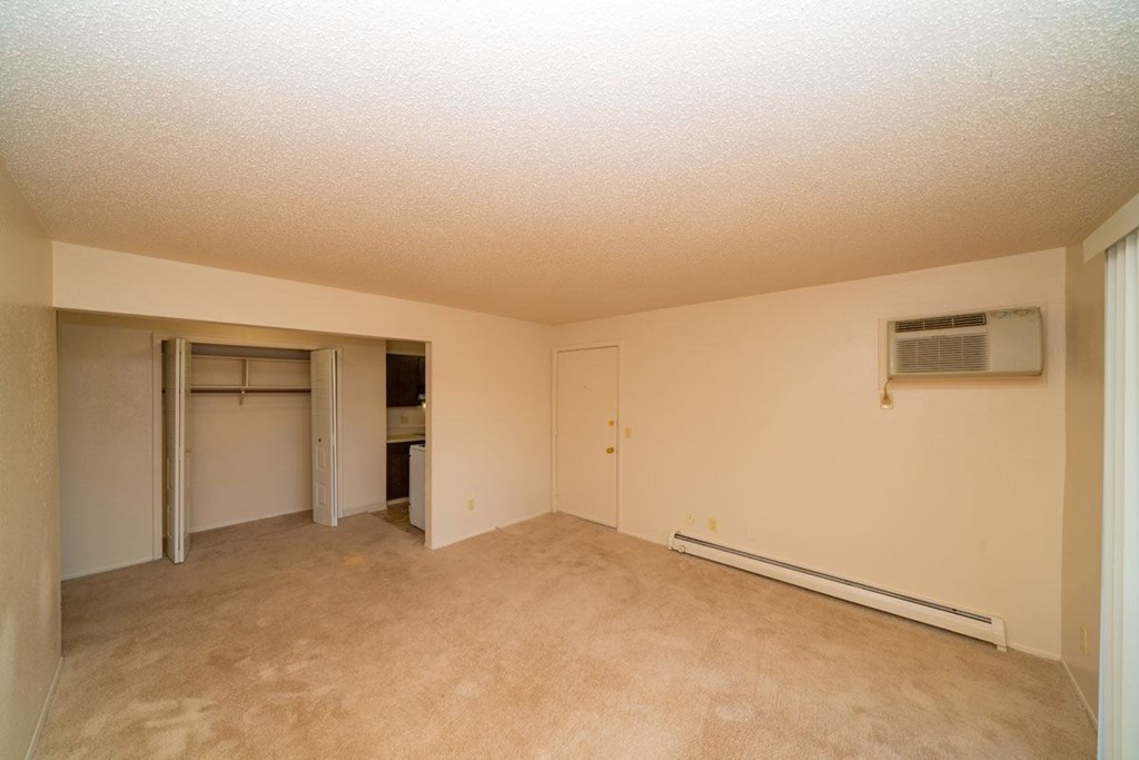 Spacious Living and Dining Areas at Waverly Park Apartments, Michigan, 48911