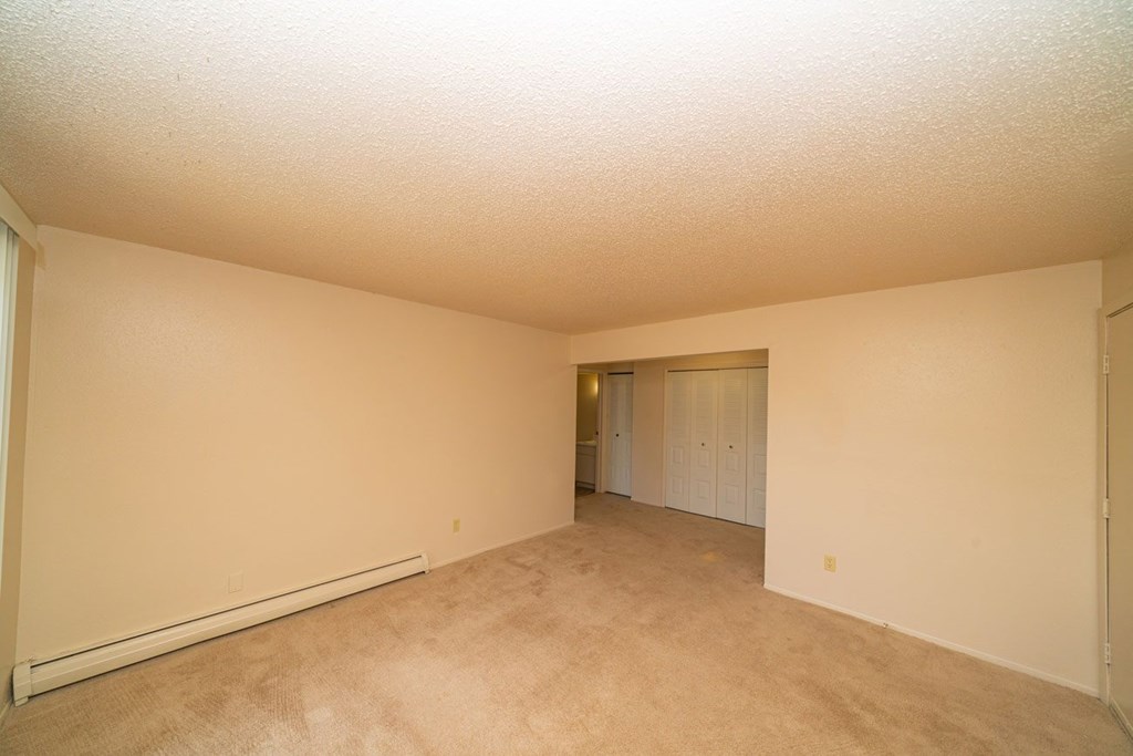 A large living and dining room at Waverly Park Apartments, Michigan, 48911