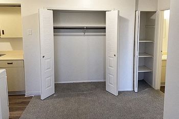 Large dining room and linen closets at Waverly Park Apartments, Lansing, Michigan