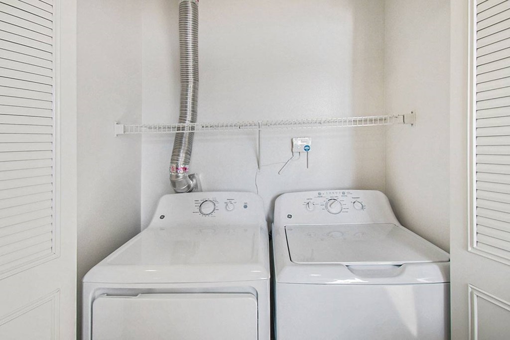 A full size washer and dryer at West Hampton Park Apartments in Elkhorn, NE 68022