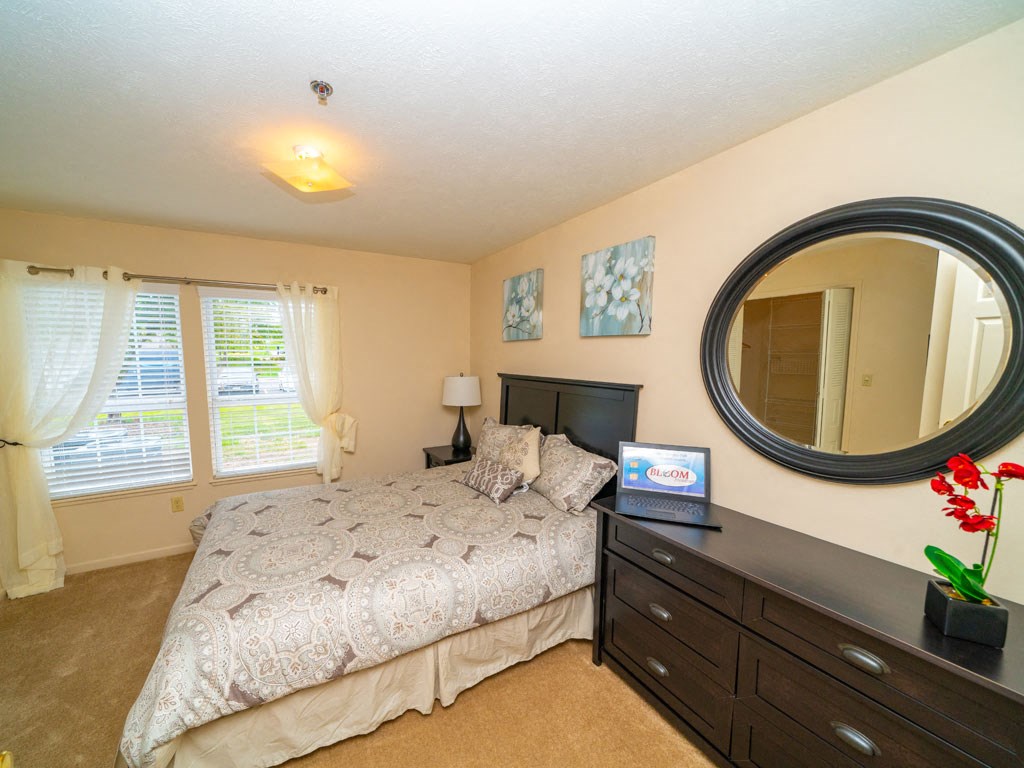Beautiful Bright Bedroom With Wide Windows at West Hampton Park Apartment Homes, Elkhorn