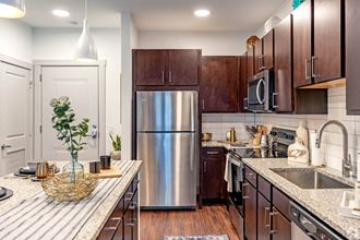 Fully Equipped Kitchen at Valor at The Realm, Lewisville, TX - Photo Gallery 2