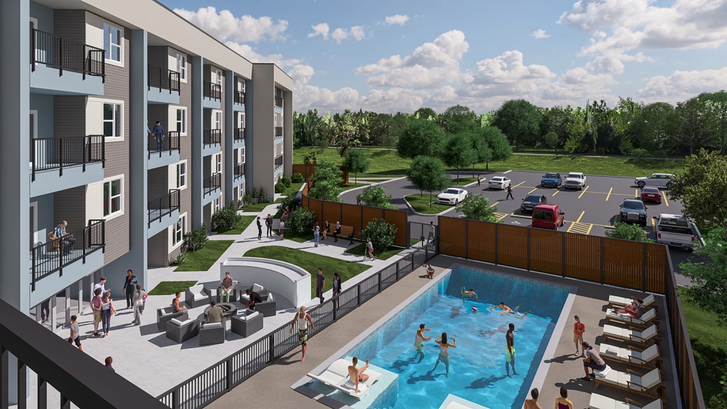 A group of people are gathered around a swimming pool.