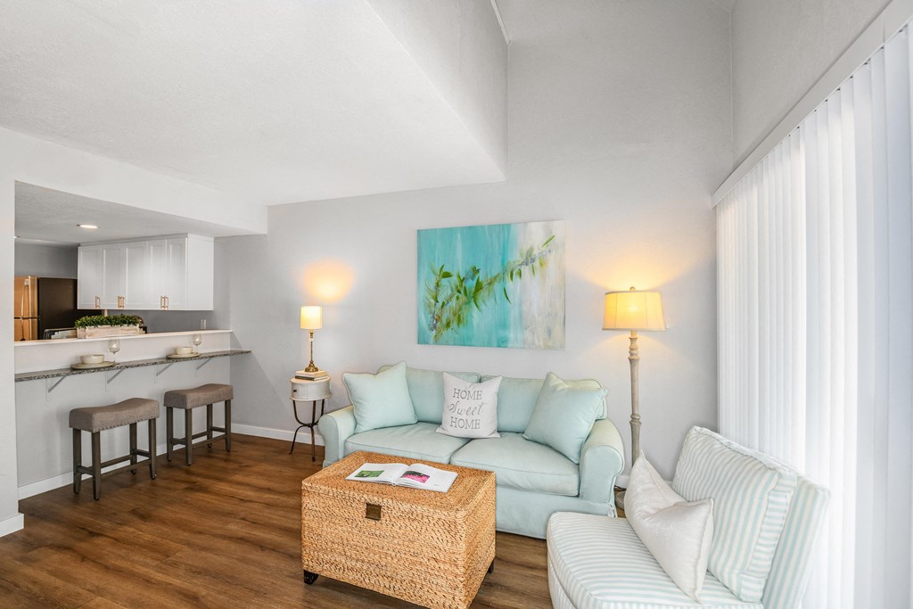 a living room with a couch and a table