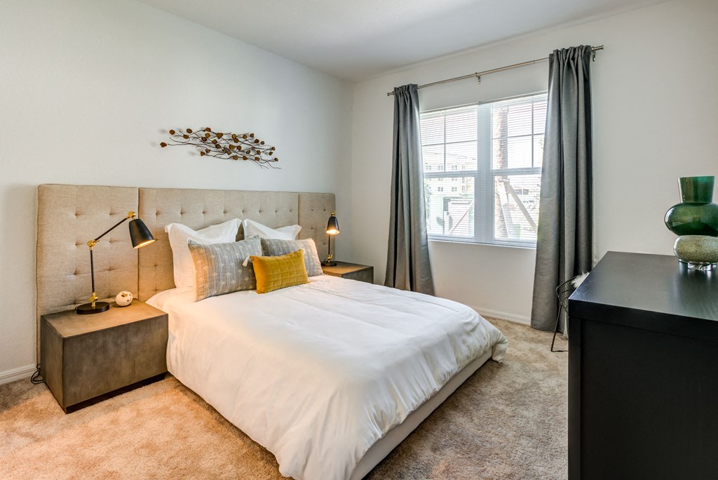 spacious, carpeted bedroom