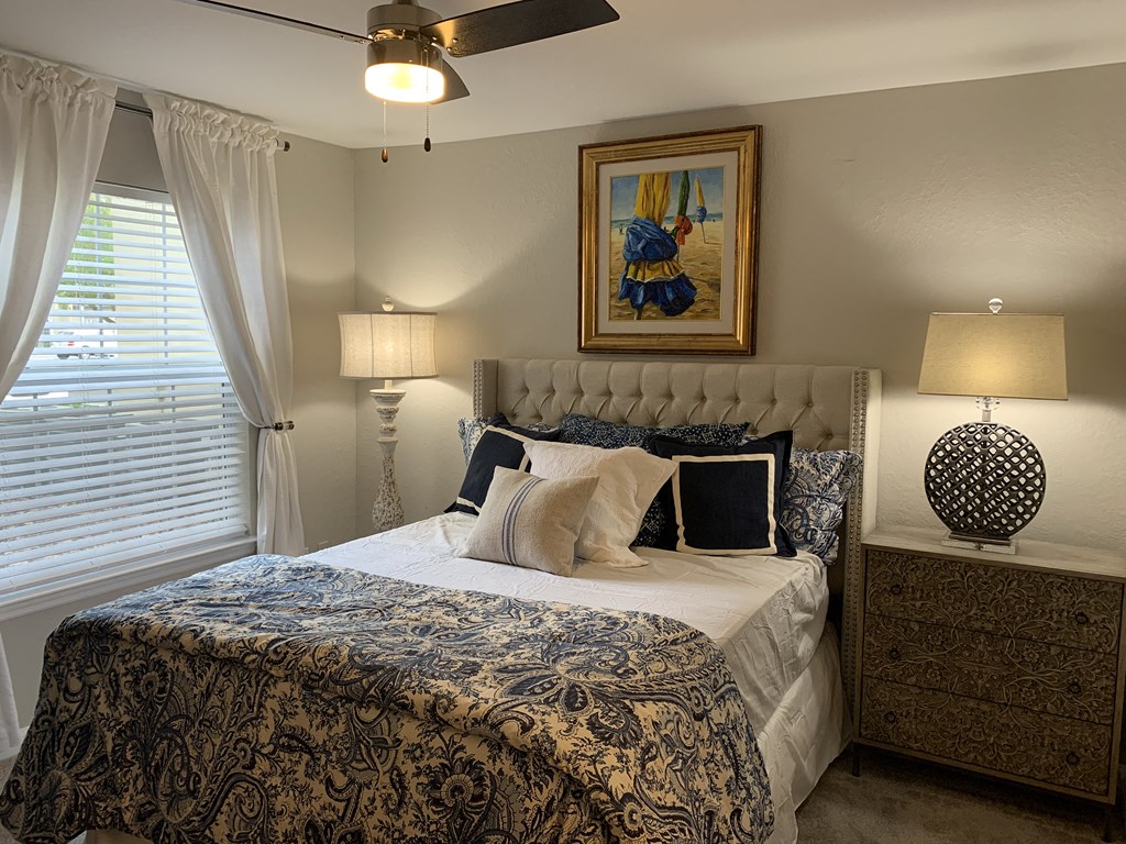 Compass master suite with king size bed and dresser