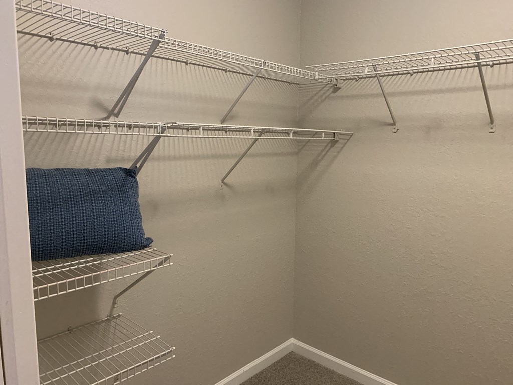 Compass master closet with shelving