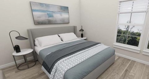 a bedroom with a bed and a painting on the wall