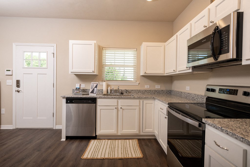 kitchen with granit coutners and stainless steel counters