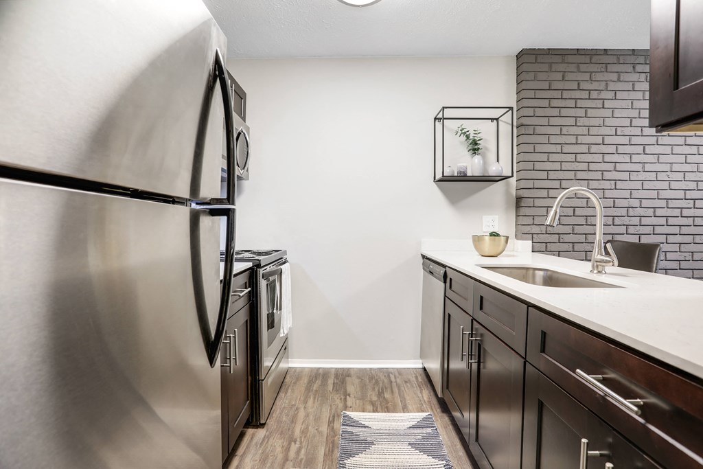 the preserve at ballantyne commons apartment kitchen with stainless steel appliances