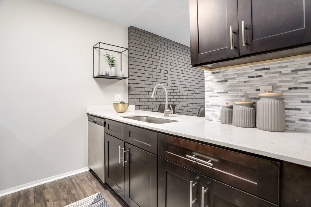 the preserve at ballantyne commons apartment kitchen with sink and cabinets