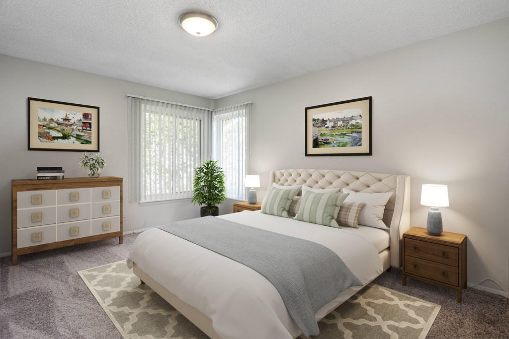 an example of a bedroom with a bed and a dresser