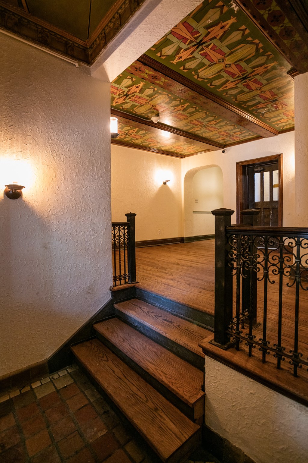 staircase with titled flooring