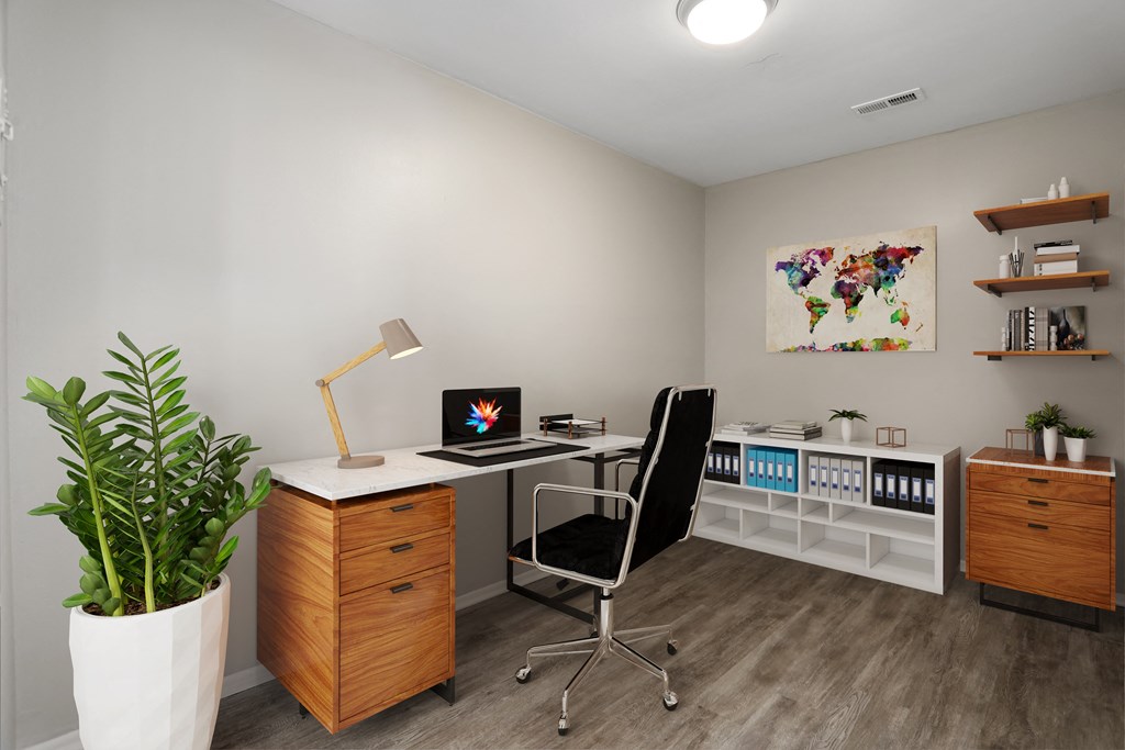 a home office with a desk and a computer