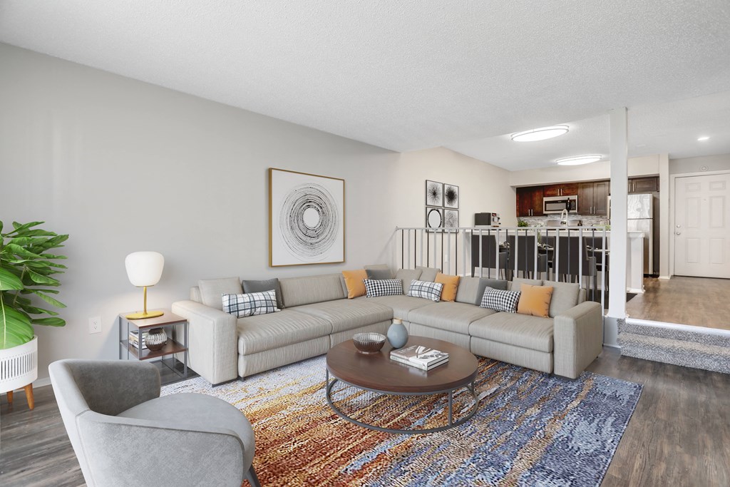 a living room with a couch and a table