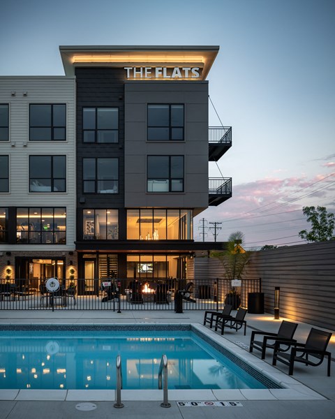 Pool View In Night at Flats at Iron Ridge, Ferndale Michigan