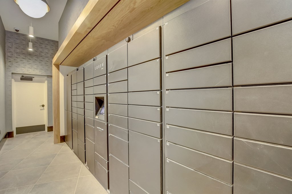 the lockers in the hallway of a building with a door