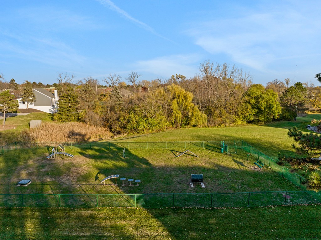 a view of the backyard from the roof of a house