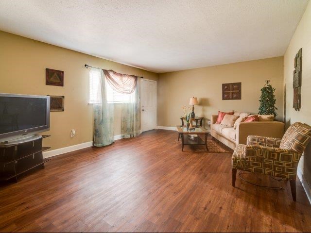a living room with a couch and a television