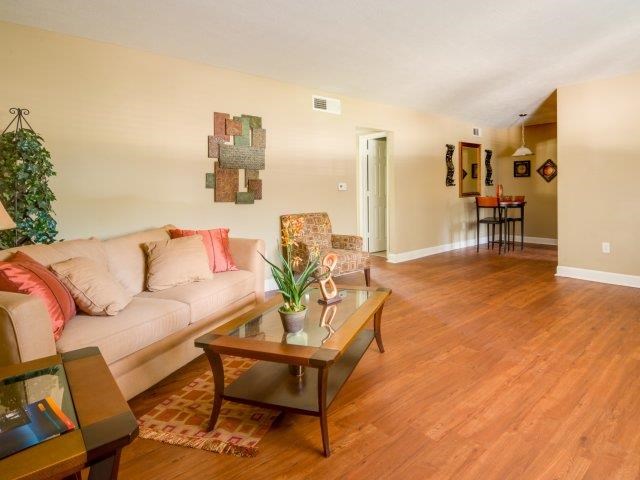 a living room with a couch and a table