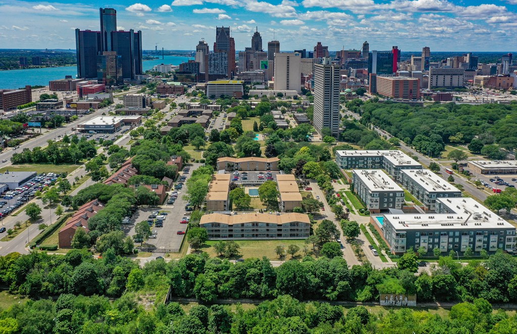 an aerial view of the city with the city skyline in the background