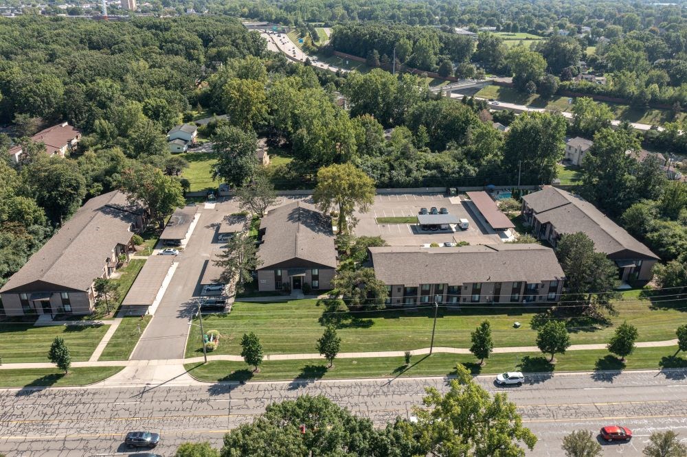 arial view of a neighborhood with houses and trees