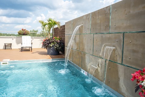 Waterfalls in the pool at the Residences of Creekside.