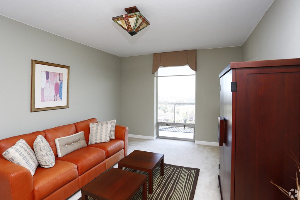 a living room with a couch and a table