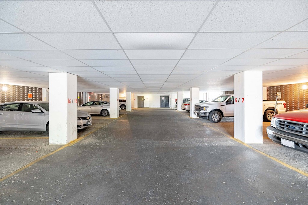 a parking garage with cars parked in it