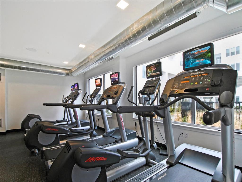 a room filled with lots of cardio equipment a room filled with lots of cardio equipment at The George, Ann Arbor, MI