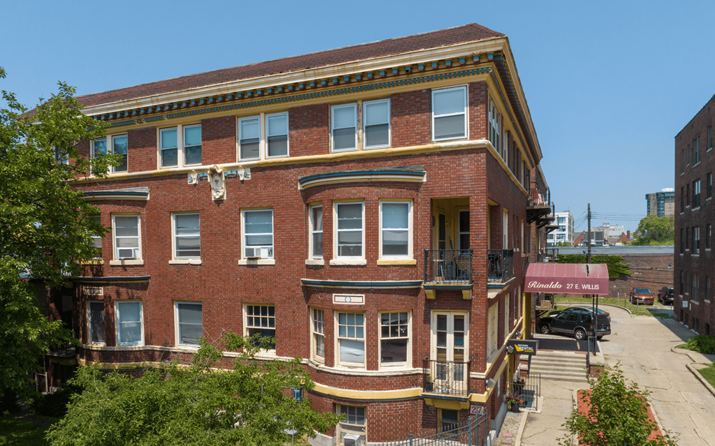 a red brick building on a city street