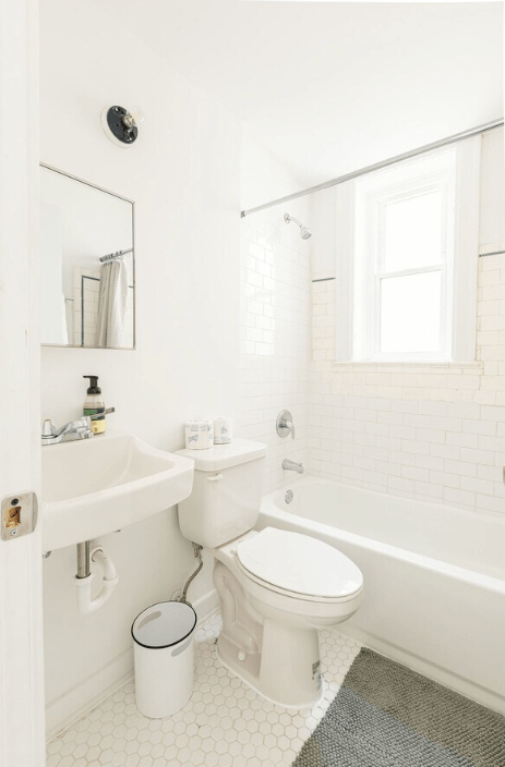 a bathroom with a sink toilet and bathtub