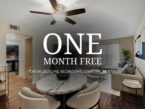 A room with a dining table and chairs and a ceiling fan with a text overlay that says "ONE MONTH FREE *ON SELECT ONE BEDROOMS, STARTING AT $799".