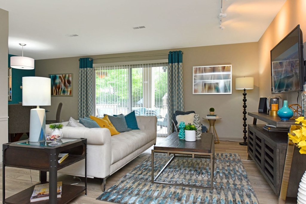 a living room with a couch and a table