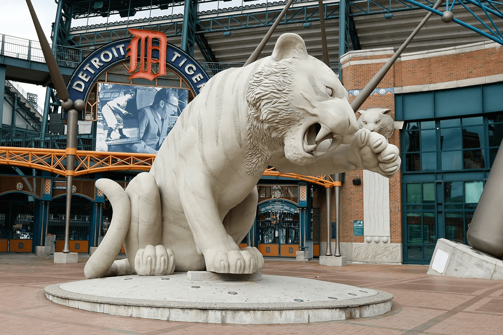 a large statue of a tiger with its mouth open at City Club Apartments Lafayette Park, Michigan